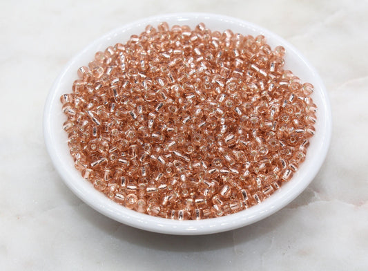 Transparent Glass Beads with Silver Lined, ideal for crafting jewelry such as bracelets and necklaces and other crafts.