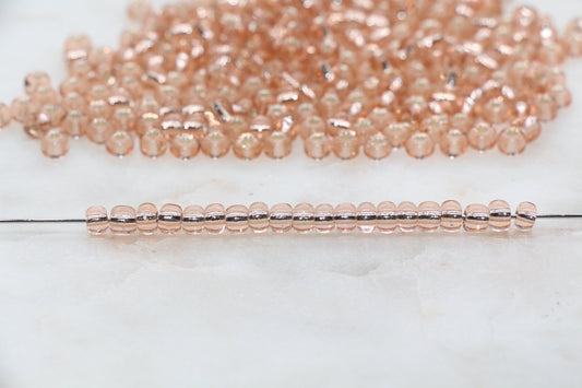 Transparent Glass Beads with Silver Lined, ideal for crafting jewelry such as bracelets and necklaces and other crafts.